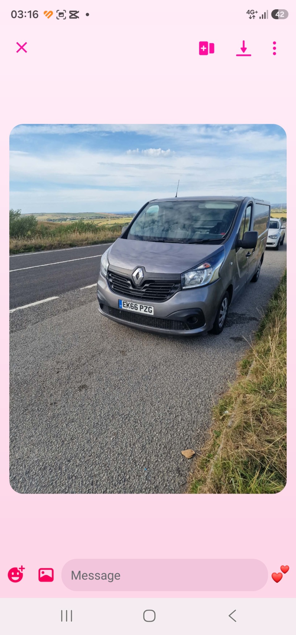 Grey Renault delivery van parked beside a road in Cornwall